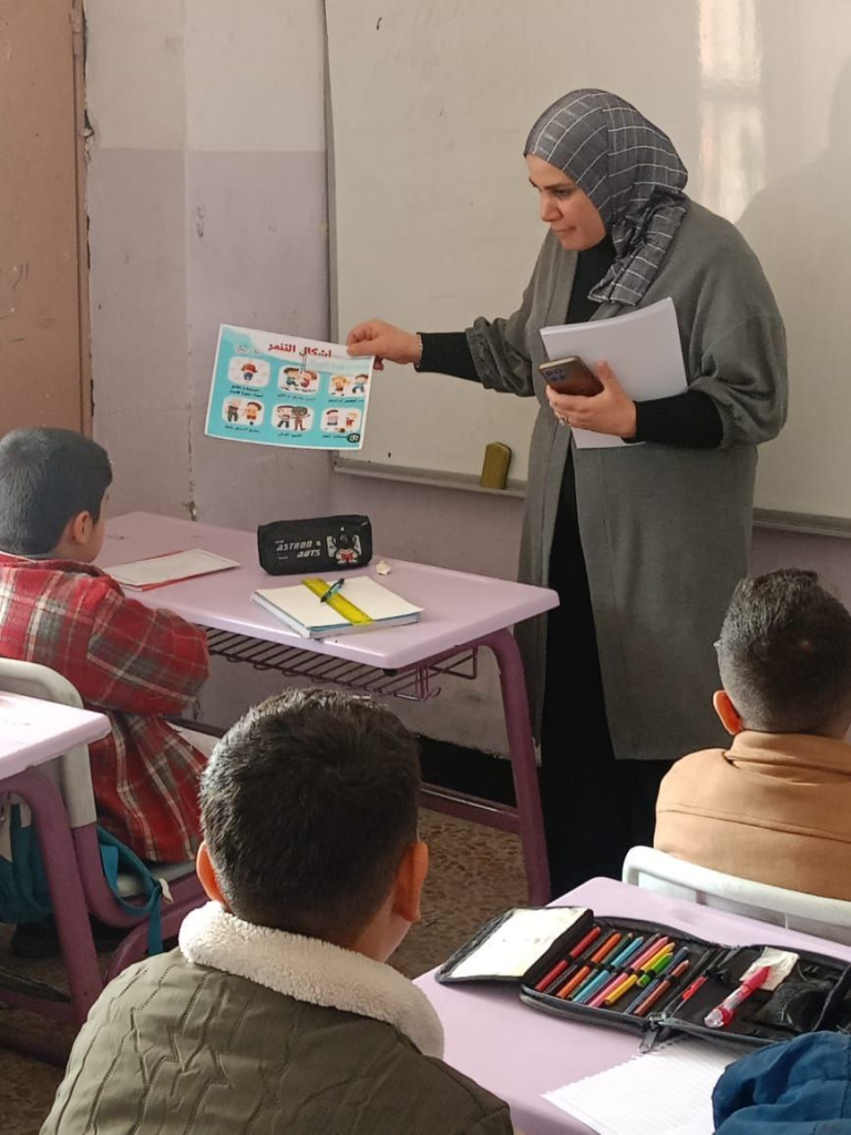 image-18-768x1024 ضمن حملة الـ 16 يومًا.. وحدة شؤون المرأة في مجاري نينوى تستهدف المدارس ببرامج توعوية